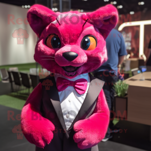Magenta Jaguarundi mascot costume character dressed with a Skirt and Bow ties