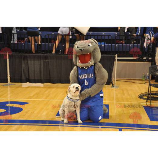 Mascotte bulldog grigio in abiti sportivi blu - Redbrokoly.com