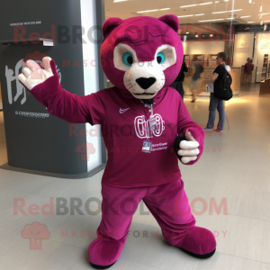 Magenta Jaguar mascot costume character dressed with a Henley Tee and Messenger bags