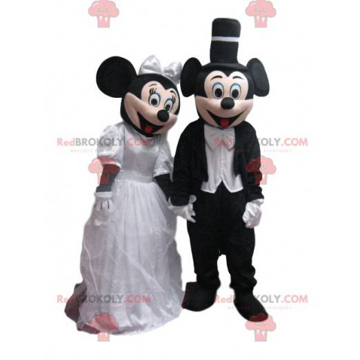 A dupla de mascotes Mickey e Minnie em trajes de casamento -