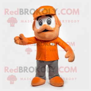 Orange Momentum mascot costume character dressed with a Blouse and Caps