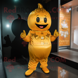 Gold Pumpkin mascot costume character dressed with a Jumpsuit and Bracelets