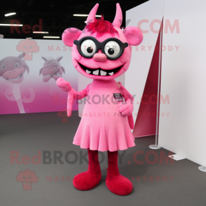 Pink Devil mascot costume character dressed with a A-Line Dress and Eyeglasses