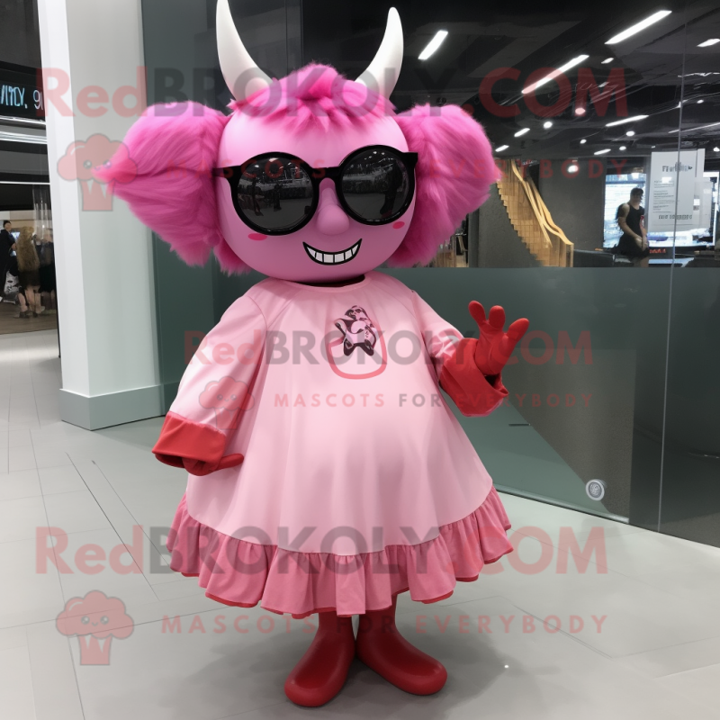 Pink Devil mascot costume character dressed with a A-Line Dress and Eyeglasses Pink Devil mascot costume character dressed with a A-Line Dress and Eyeglasses