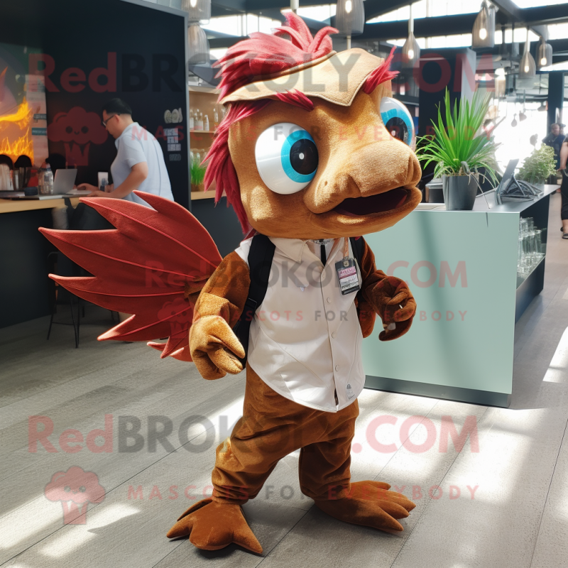 Brown Betta Fish mascot costume character dressed with a Dress Shirt and Keychains Brown Betta Fish mascot costume character dressed with a Dress Shirt and Keychains