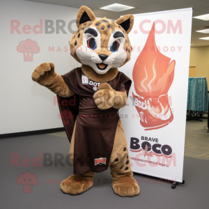 Brown Bobcat mascot costume character dressed with a Rash Guard and Shawls