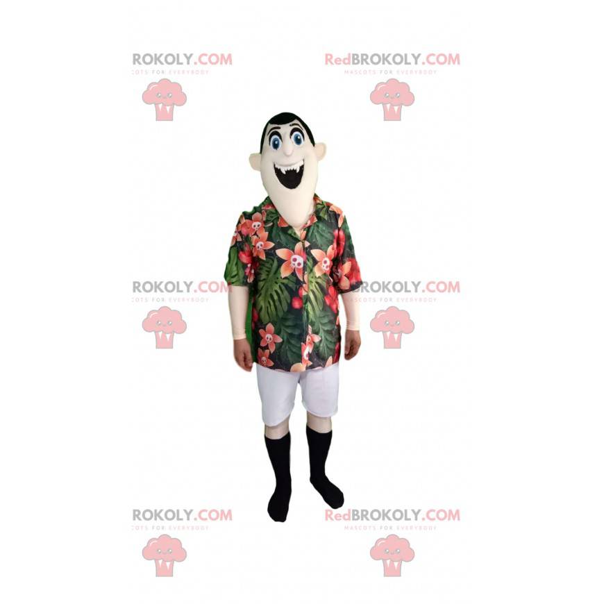 Mascotte de vampire avec une chemise tropical et un pantalon Mascotte de vampire avec une chemise tropical et un pantalon