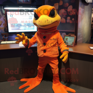 Orange Geckos mascot costume character dressed with a Culottes and Mittens