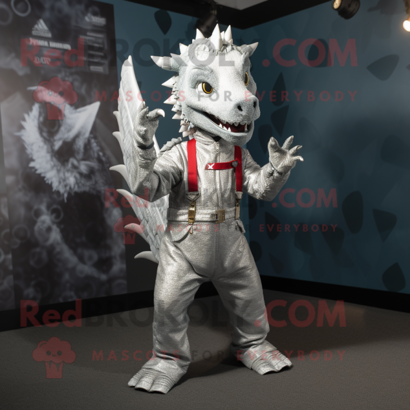 Silver Dragon mascot costume character dressed with a Dungarees and Wallets Silver Dragon mascot costume character dressed with a Dungarees and Wallets
