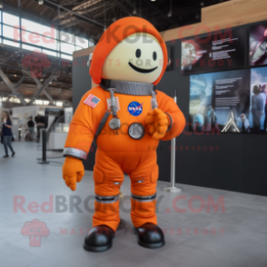 Orange Astronaut mascot costume character dressed with a Flannel Shirt and Berets