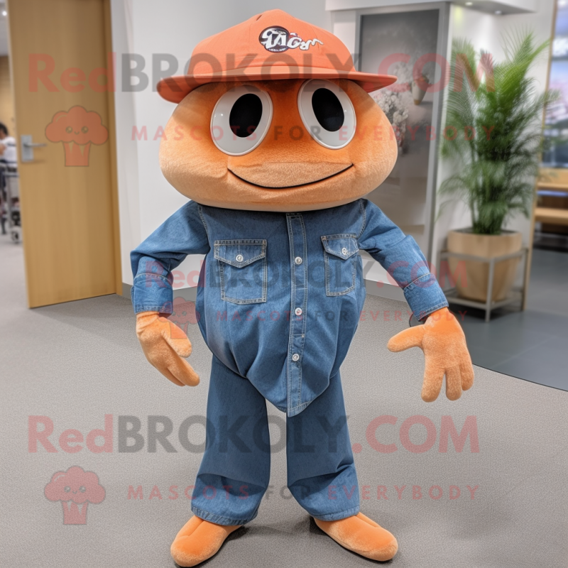 Peach Crab mascot costume character dressed with a Chambray Shirt and Hat pins