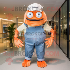 Peach Crab mascot costume character dressed with a Chambray Shirt and Hat pins