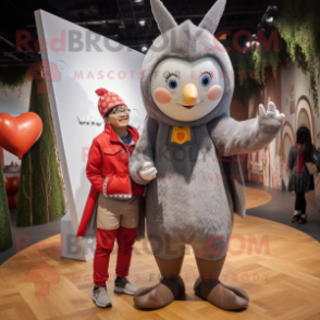 Silver Arrow Of Love mascot costume character dressed with a Corduroy Pants and Watches