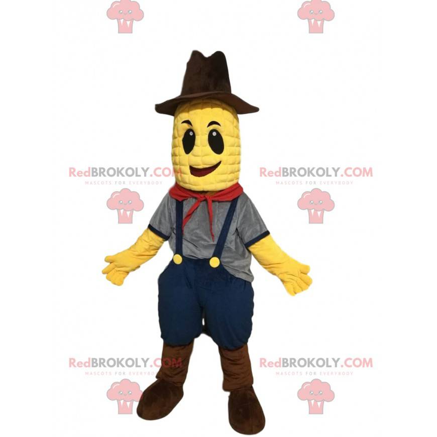 Mascote espiga de milho com macacão e chapéu de cowboy -