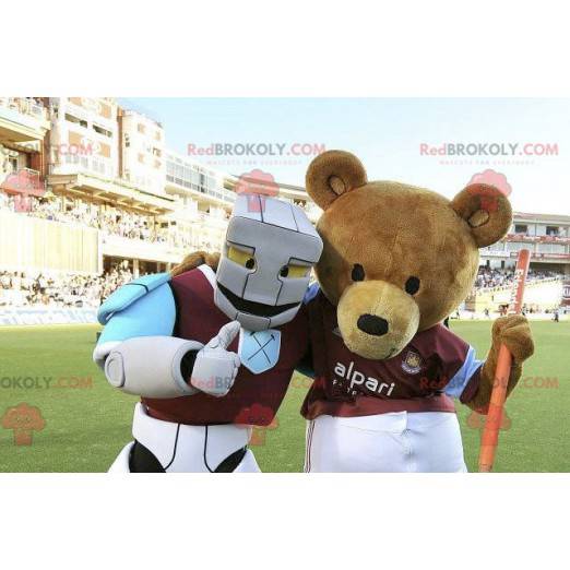 2 mascottes een bruine beer en een wit blauw en paars robot -