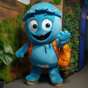 Cyan Shakshuka mascot costume character dressed with a Dungarees and Backpacks