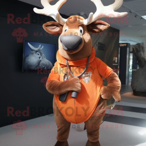 Rust Elk mascot costume character dressed with a Bootcut Jeans and Shawl pins