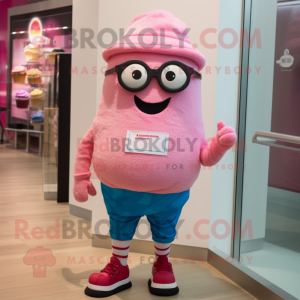 Pink Cupcake mascot costume character dressed with a Bermuda Shorts and Eyeglasses