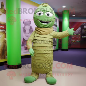 Green Mummy mascot costume character dressed with a Chinos and Wraps