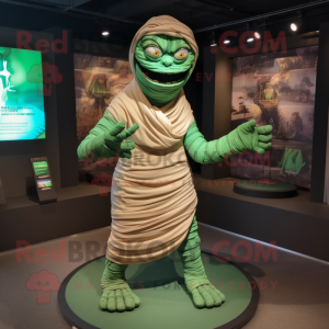 Green Mummy mascot costume character dressed with a Chinos and Wraps