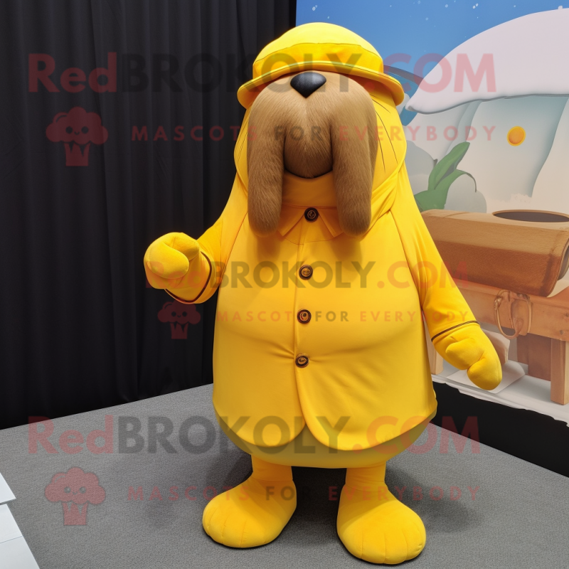 Yellow Walrus mascot costume character dressed with a Culottes and Brooches Yellow Walrus mascot costume character dressed with a Culottes and Brooches