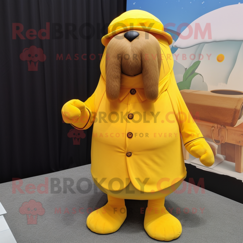 Yellow Walrus mascot costume character dressed with a Culottes and Brooches