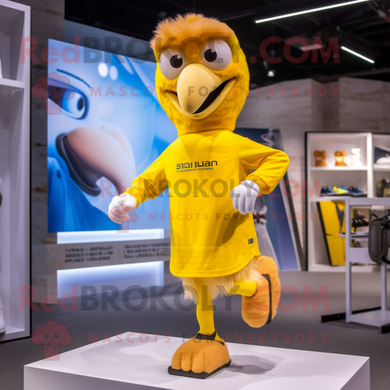 Yellow Eagle mascot costume character dressed with a Running Shorts and Caps Yellow Eagle mascot costume character dressed with a Running Shorts and Caps