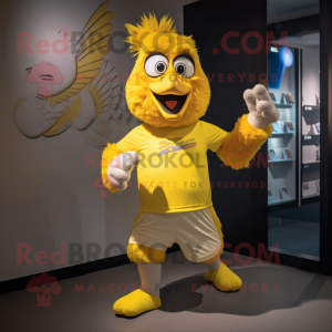 Yellow Eagle mascot costume character dressed with a Running Shorts and Caps