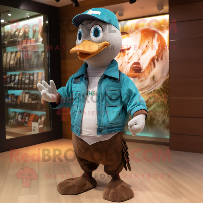 Teal Quail mascot costume character dressed with a Leather Jacket and Beanies