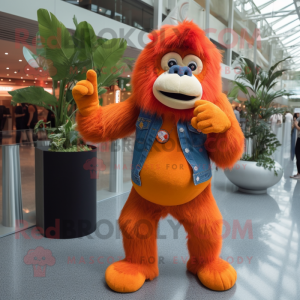 Orange Orangutan mascot costume character dressed with a Flare Jeans and Ties