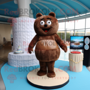 Brown Wedding Cake mascot costume character dressed with a One-Piece Swimsuit and Rings