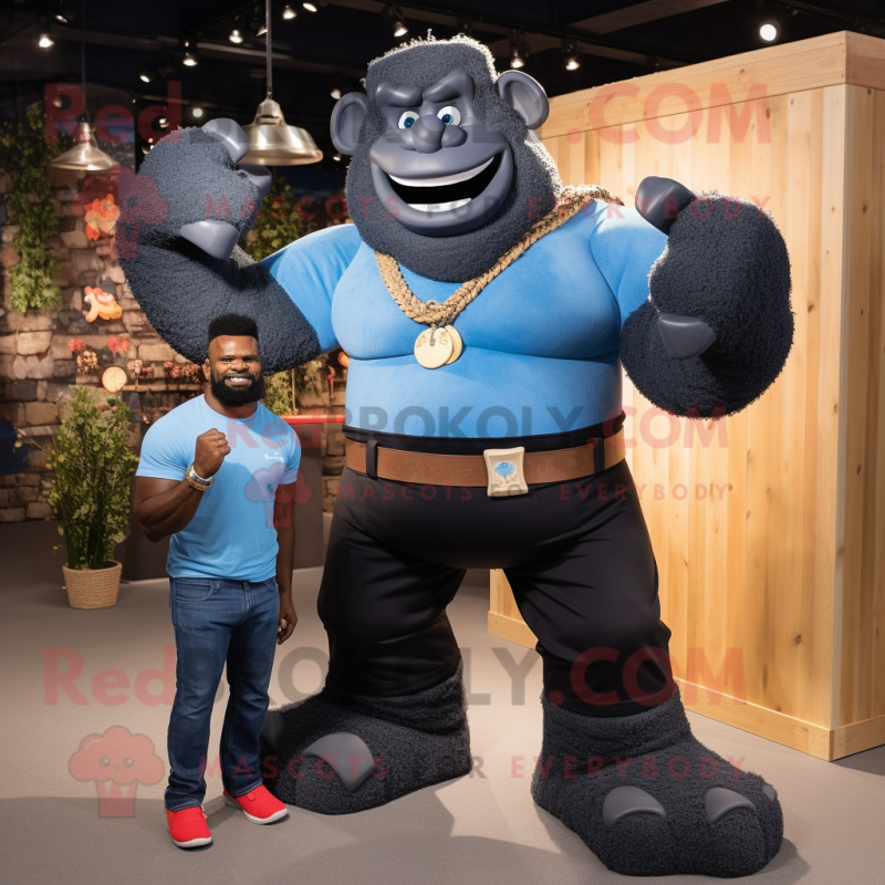 Black Strongman mascot costume character dressed with a Denim Shirt and Anklets Black Strongman mascot costume character dressed with a Denim Shirt and Anklets