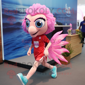 Pink Betta Fish mascot costume character dressed with a Running Shorts and Brooches