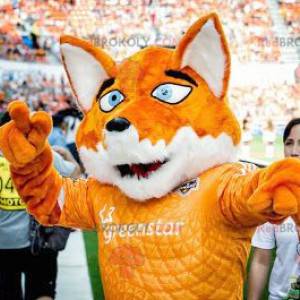 Mascotte de renard orange et blanc avec des yeux bleus -