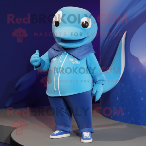 Blue Whale mascot costume character dressed with a Graphic Tee and Rings