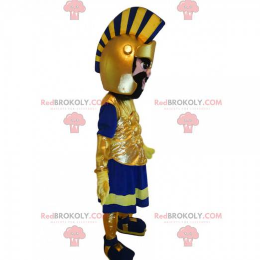 Mascote guerreiro romano com um magnífico capacete dourado -