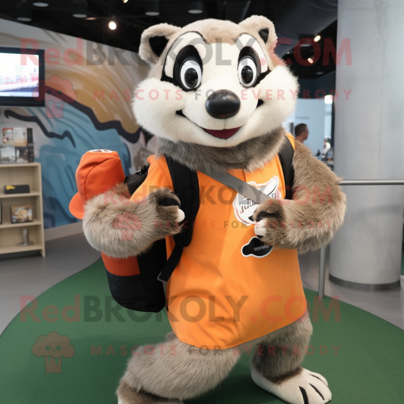 Tan Badger mascot costume character dressed with a Graphic Tee and Messenger bags