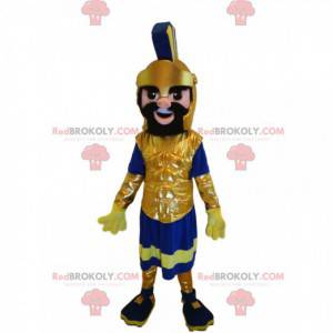Mascote guerreiro romano com um magnífico capacete dourado -