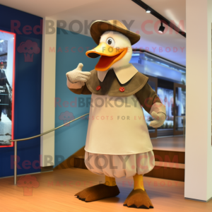Tan Muscovy Duck mascot costume character dressed with a Coat and Foot pads
