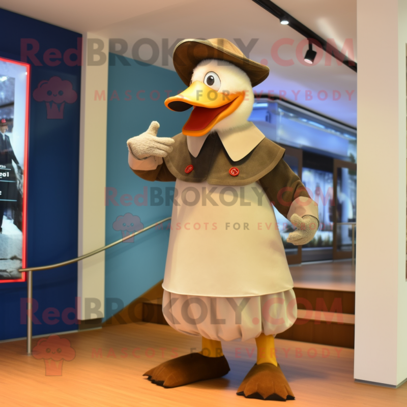 Tan Muscovy Duck mascot costume character dressed with a Coat and Foot pads Tan Muscovy Duck mascot costume character dressed with a Coat and Foot pads