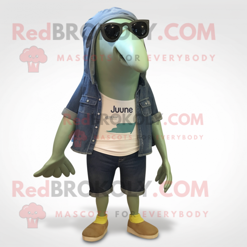 Olive Humpback Whale mascot costume character dressed with a Denim Shorts and Eyeglasses