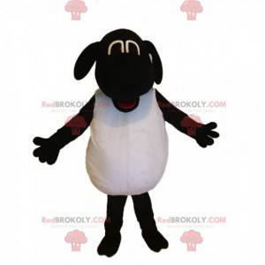Mascote engraçado ovelha preto e branco - Redbrokoly.com