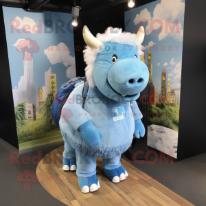 Sky Blue Woolly Rhinoceros mascot costume character dressed with a Polo Tee and Backpacks