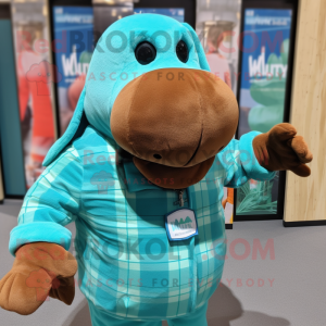 Turquoise Walrus mascot costume character dressed with a Flannel Shirt and Mittens