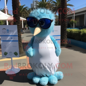 Sky Blue Kiwi mascot costume character dressed with a Wedding Dress and Sunglasses