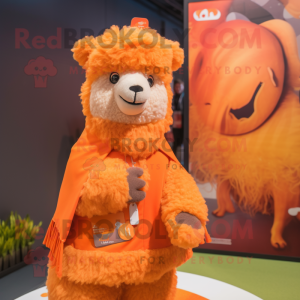 Orange Alpaca mascot costume character dressed with a Cover-up and Brooches