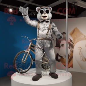 Silver Trapeze Artist mascot costume character dressed with a Moto Jacket and Suspenders