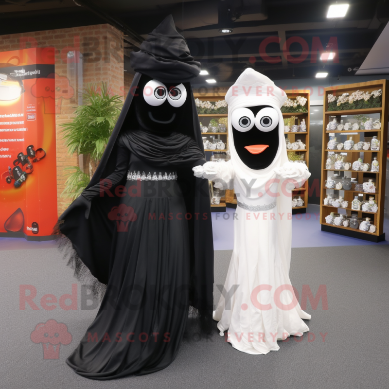 Black Fajitas mascot costume character dressed with a Wedding Dress and Scarves Black Fajitas mascot costume character dressed with a Wedding Dress and Scarves