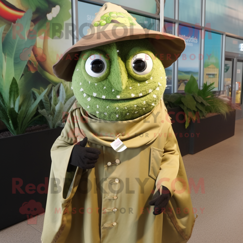 Olive Fish Tacos mascot costume character dressed with a Raincoat and Scarf clips Olive Fish Tacos mascot costume character dressed with a Raincoat and Scarf clips