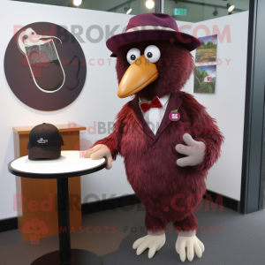 Maroon Kiwi mascot costume character dressed with a Dress Shirt and Rings